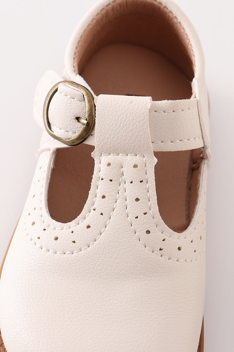 White vintage leather shoes